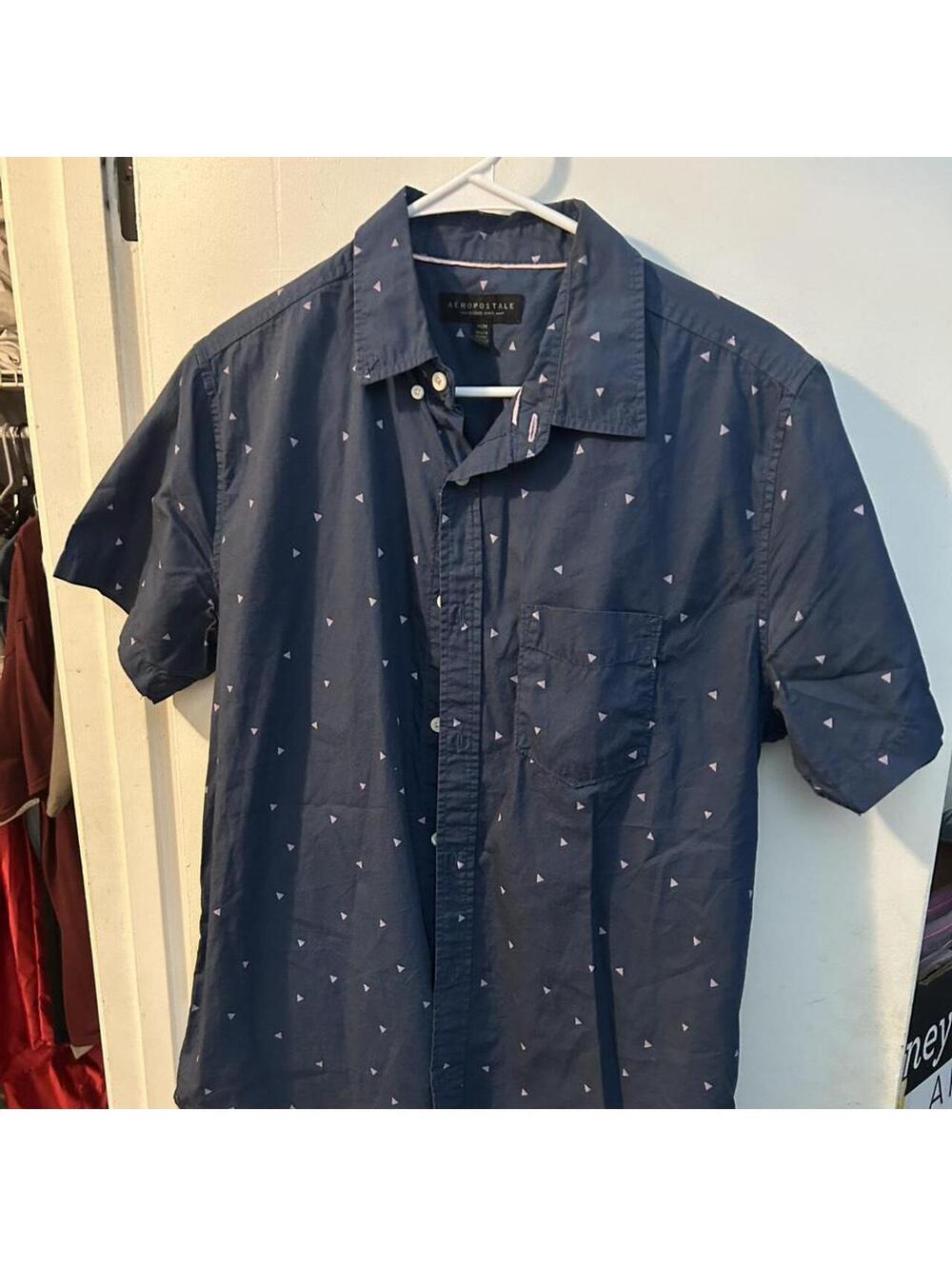 Navy blue Aeropostale button-up shirt with small white triangles, size M